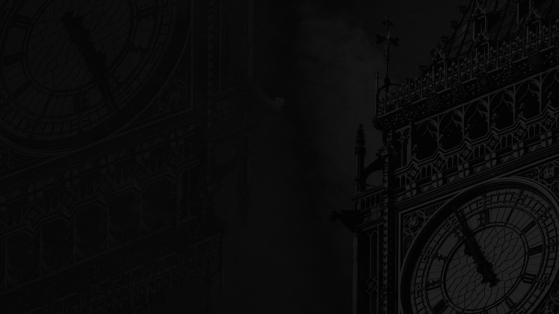 A dark, moody image of a clock tower with intricate architectural details, partially obscured by shadows.